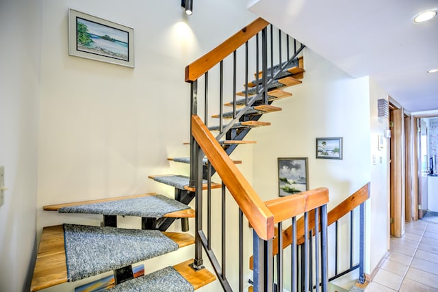 1133 W Ocean Dr Unit 2, Key Colony, FL 33051 - stairway featuring tile patterned floors and recessed lighting