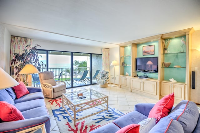 1133 W Ocean Dr Unit 2, Key Colony, FL 33051 - living area featuring built in features and light tile patterned flooring