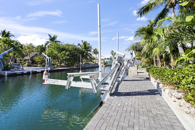 dock area featuring a water view