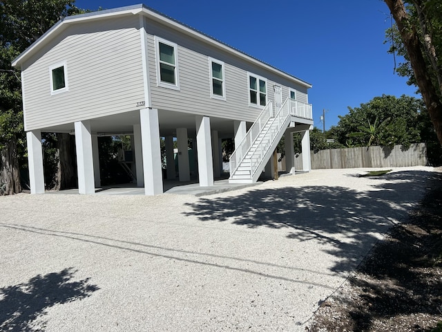 view of front facade with a carport