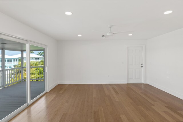 spare room featuring ceiling fan and wood-type flooring