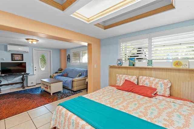 bedroom featuring ornamental molding, tile patterned flooring, and a wall unit AC