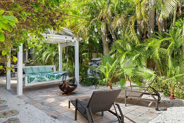 view of patio / terrace featuring an outdoor hangout area and a pergola