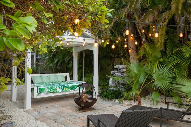 view of patio / terrace featuring an outdoor living space and a pergola