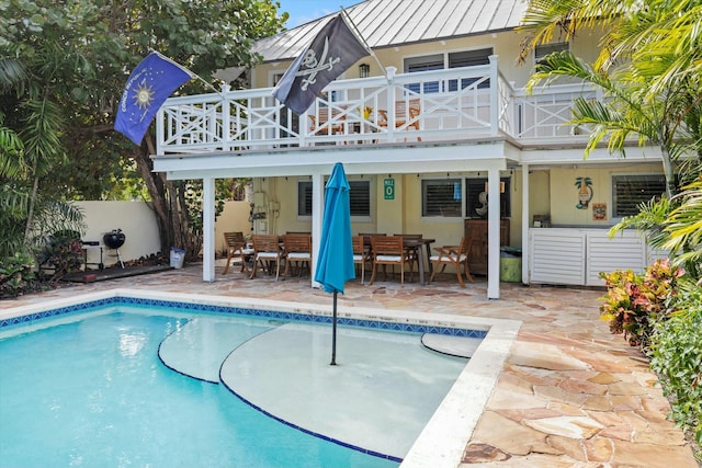 view of pool featuring a patio area