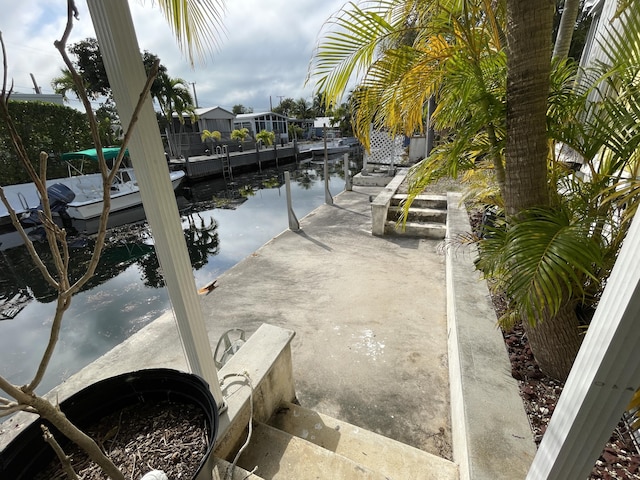 water view featuring a dock