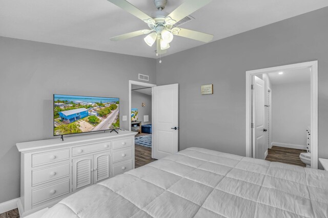 25081 Overseas Hwy, Summerland, FL 33042 - bedroom featuring wood finished floors, baseboards, and a ceiling fan