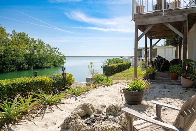 exterior space with a water view