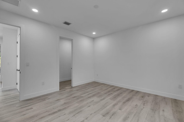 unfurnished room featuring light hardwood / wood-style flooring