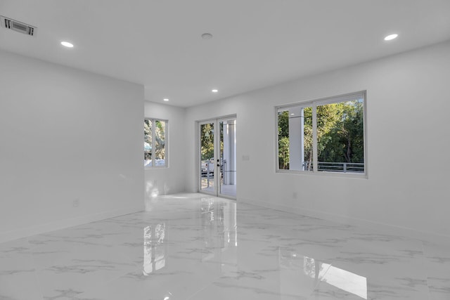 empty room featuring french doors