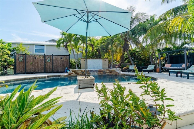 view of pool featuring a pergola and a patio area