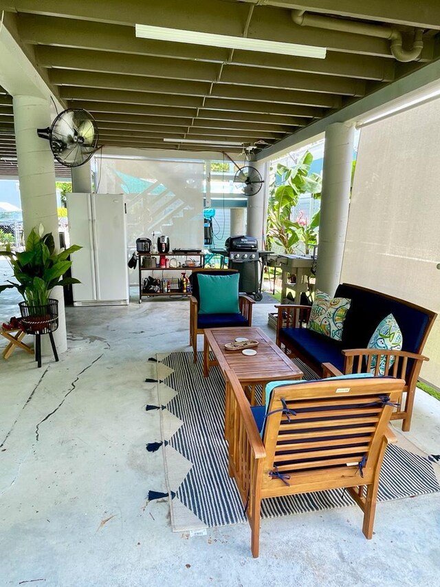 view of patio featuring area for grilling and outdoor lounge area