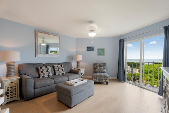 500 Burton Dr Unit 5307, Key Largo, FL 33070 - living room featuring a ceiling fan, light wood-style floors, and a water view