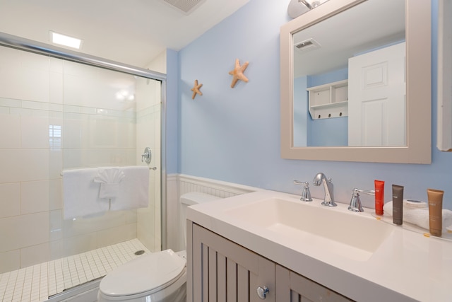 500 Burton Dr Unit 5307, Key Largo, FL 33070 - bathroom featuring a stall shower, vanity, and a wainscoted wall