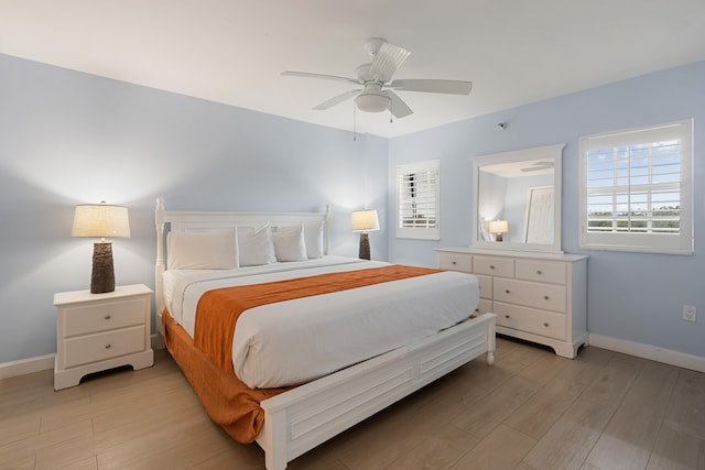 500 Burton Dr Unit 5307, Key Largo, FL 33070 - bedroom featuring light wood finished floors and a ceiling fan