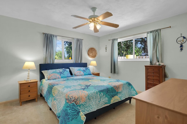 634 Ponce De Leon Blvd, Key Largo, FL 33037 - bedroom featuring light carpet, ceiling fan, and baseboards