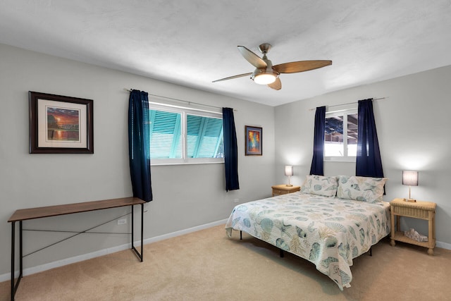 634 Ponce De Leon Blvd, Key Largo, FL 33037 - carpeted bedroom featuring multiple windows, baseboards, and a ceiling fan