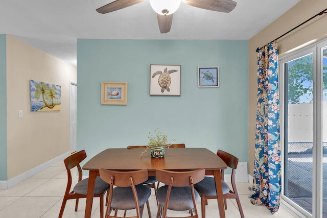 634 Ponce De Leon Blvd, Key Largo, FL 33037 - dining space featuring a ceiling fan, baseboards, and light tile patterned floors