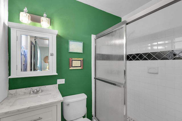 634 Ponce De Leon Blvd, Key Largo, FL 33037 - bathroom featuring vanity, toilet, and a shower stall