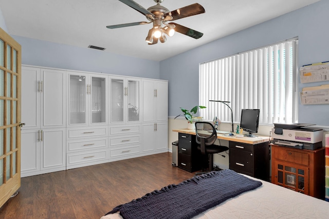 634 Ponce De Leon Blvd, Key Largo, FL 33037 - bedroom with multiple windows, dark wood-type flooring, a desk, and a ceiling fan