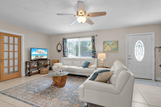 634 Ponce De Leon Blvd, Key Largo, FL 33037 - living room featuring tile patterned flooring and ceiling fan