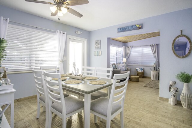 dining area featuring ceiling fan and light hardwood / wood-style flooring