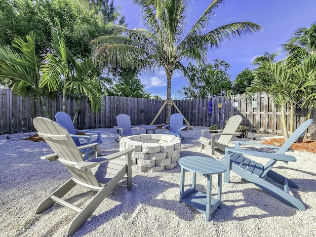 view of patio / terrace with an outdoor fire pit