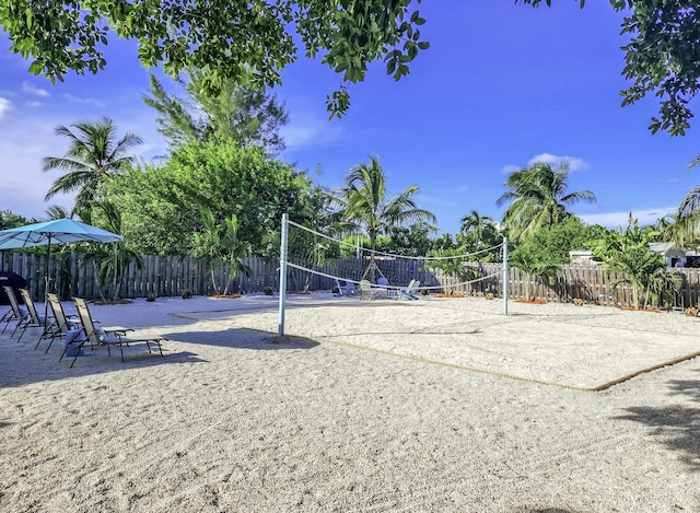 view of home's community featuring volleyball court