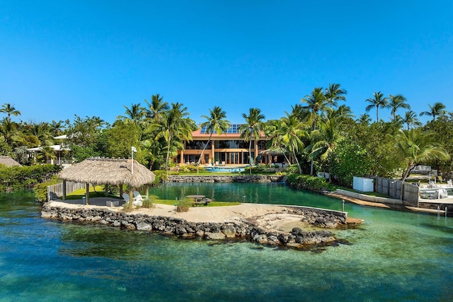 surrounding community with a gazebo and a water view