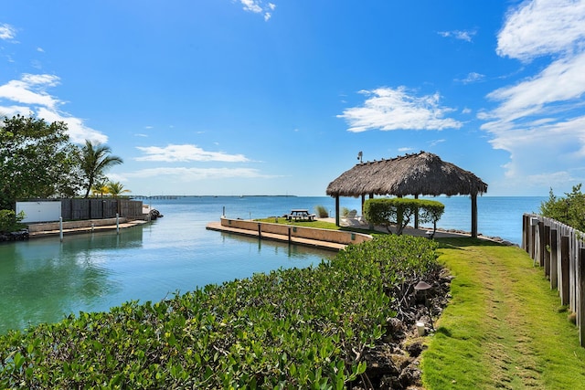 dock area featuring a gazebo and a water view