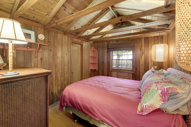 bedroom featuring hardwood / wood-style flooring, vaulted ceiling with beams, wood ceiling, and wooden walls