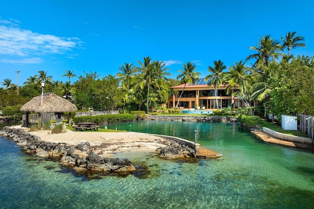 exterior space with a gazebo and a water view