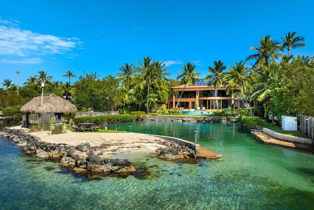 exterior space with a gazebo and a water view