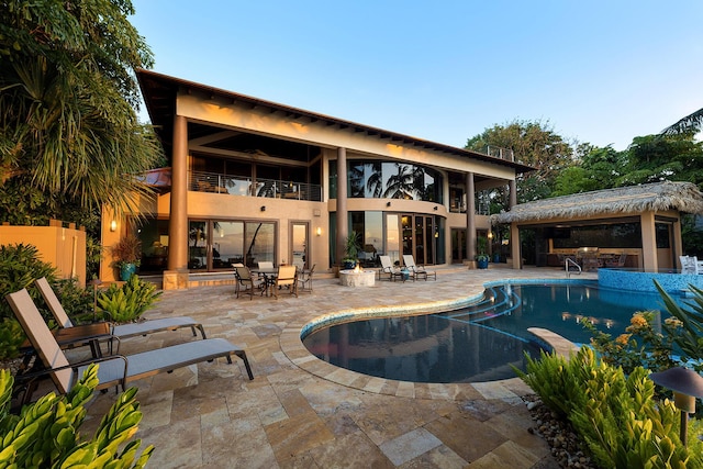 view of swimming pool with a patio