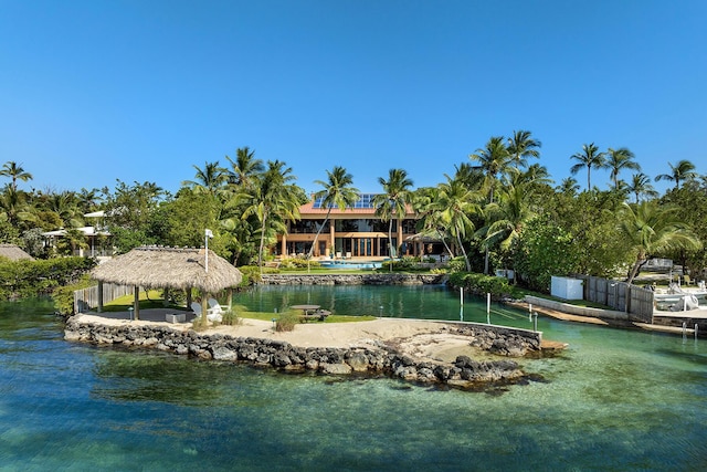 surrounding community featuring a gazebo and a water view