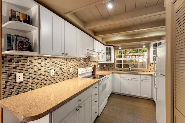 kitchen with tasteful backsplash, white cabinetry, and white appliances