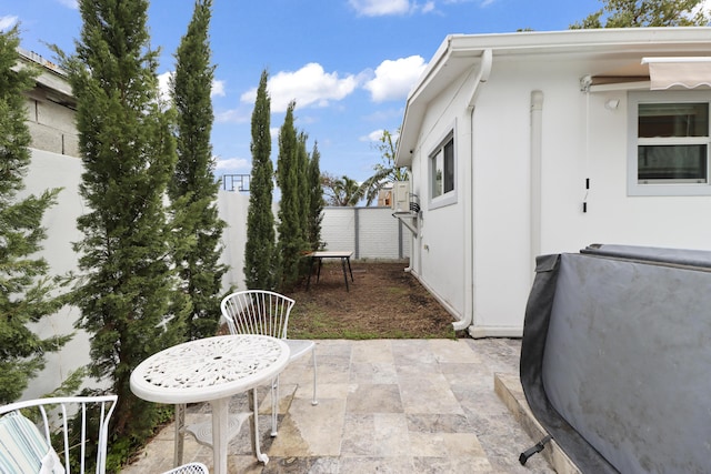 view of patio / terrace with fence