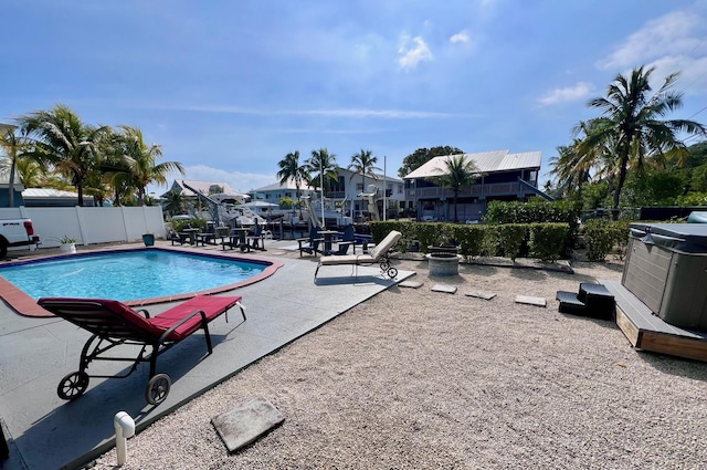 view of swimming pool with a patio