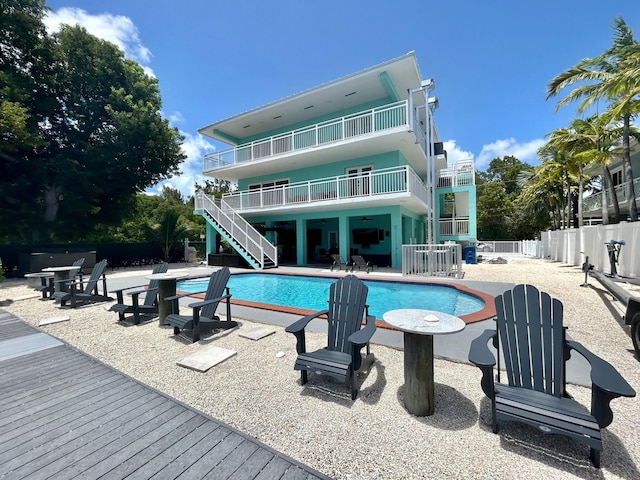 view of swimming pool with a patio area