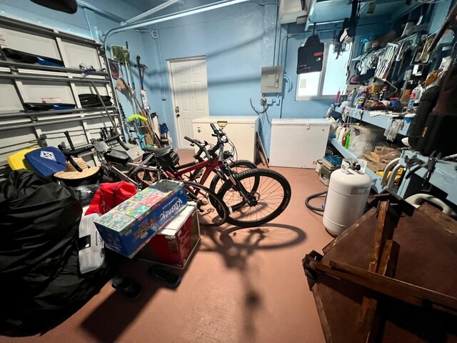 garage with a workshop area