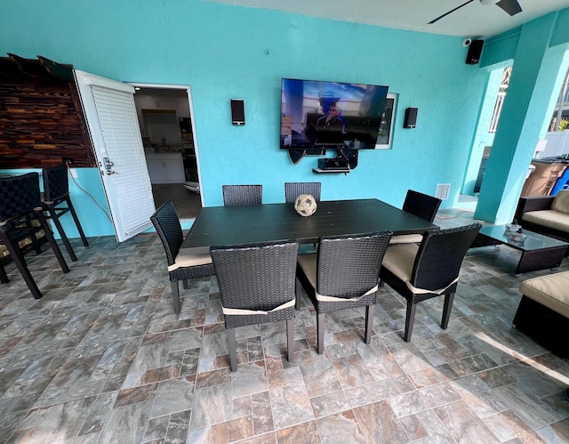 dining space featuring sink