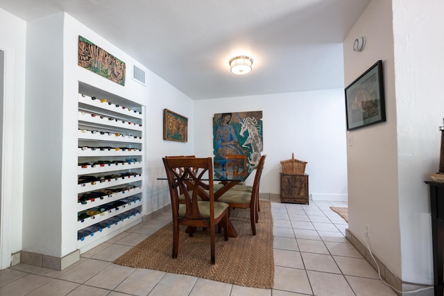 dining area with light tile patterned floors