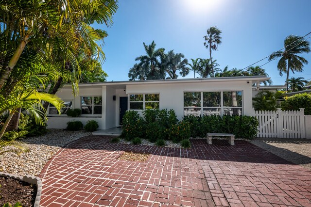 ranch-style house with a patio