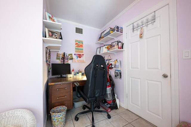 tiled home office featuring ornamental molding