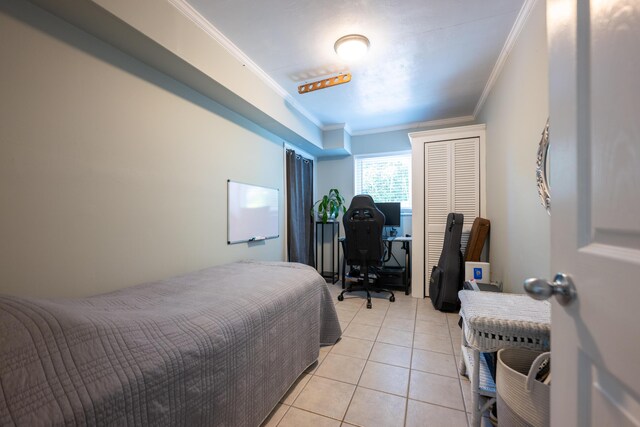 tiled bedroom with crown molding