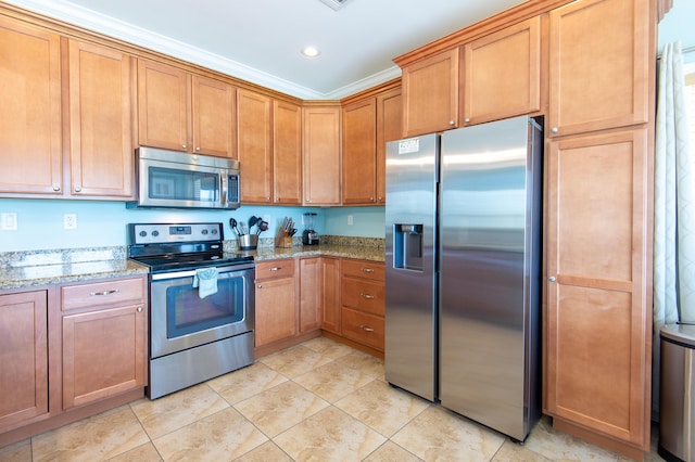 kitchen with stainless steel appliances, light tile patterned flooring, and light stone countertops