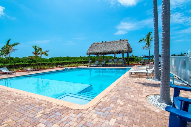 view of swimming pool featuring a gazebo and a patio