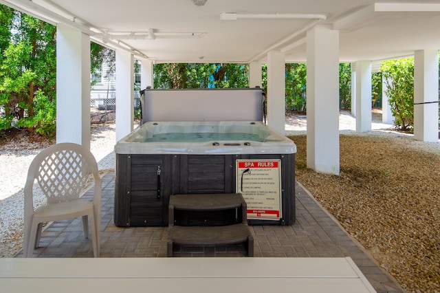 view of patio featuring a hot tub