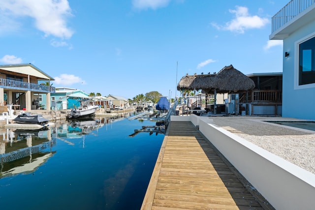 dock area with a water view