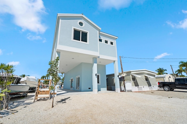 view of front of house featuring a carport